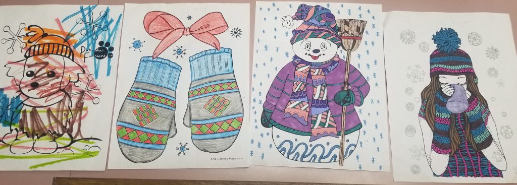 coloring contest entries. A dog, some mittens, a snowman, a girl drinking a hot drink in the snow